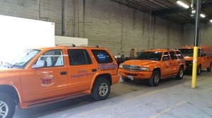 Water Damage Restoration SUV's At Warehouse